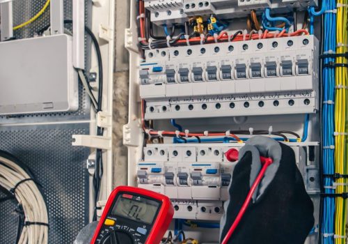 man-electrical-technician-working-switchboard-with-fuses-1-scaled-q7k42lksvbdw6ig8rgzgxbzj2zz7h02ji0vjy5wjzk